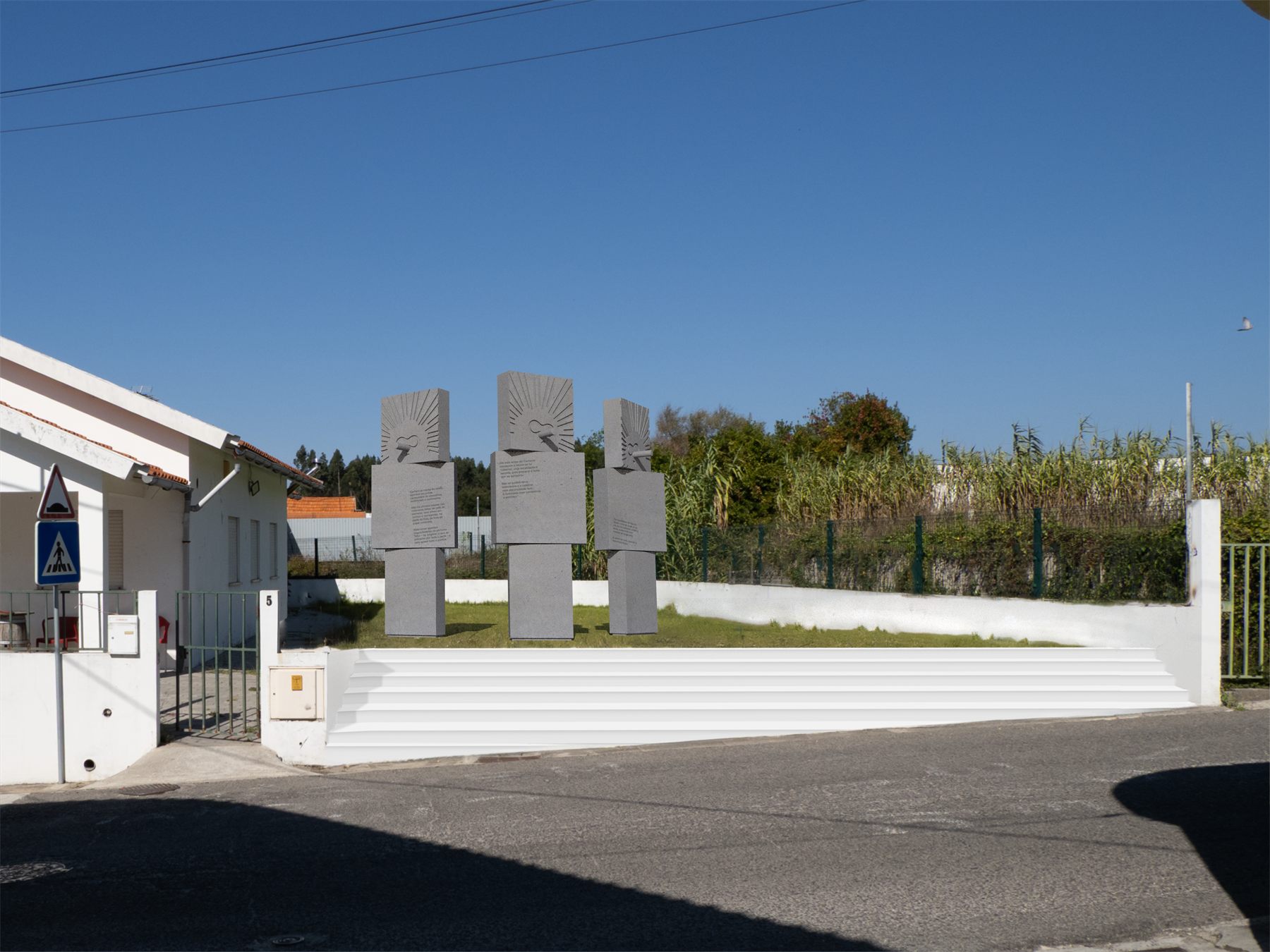 A second photomontage of the totems on the site, seen from the road