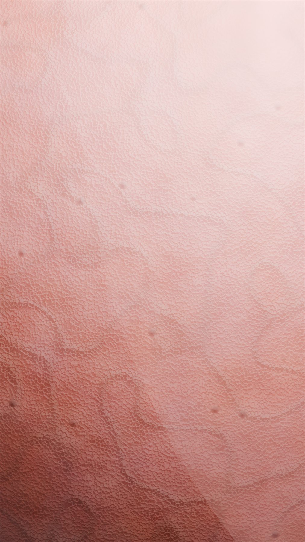 Close view of the finished skin material, showing pores and colour variation across the surface